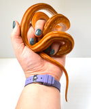 Load image into Gallery viewer, 2024 Female Orange Ghost Stripe Suntiger Het Albino (Purple) Reticulated Python